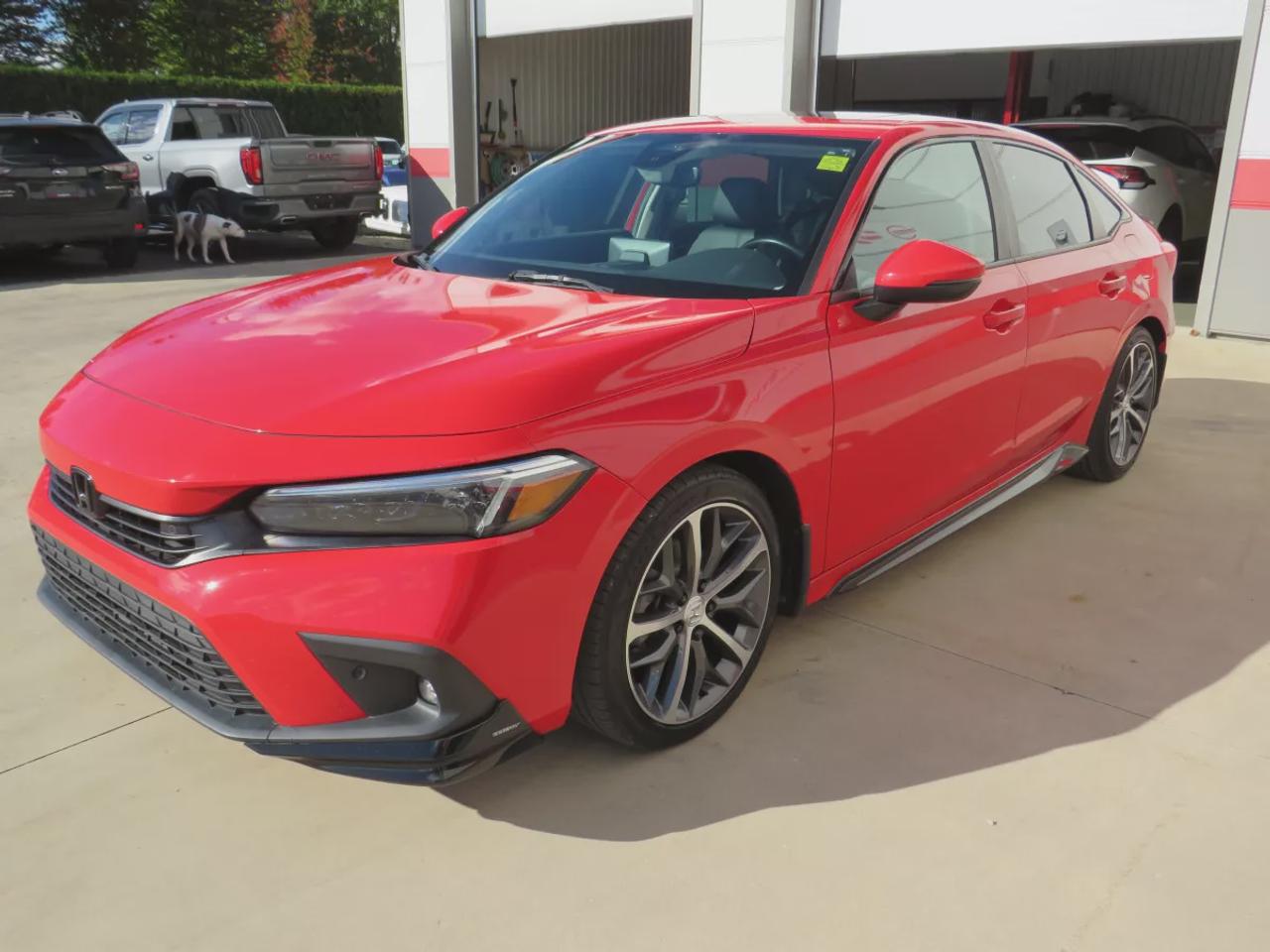 2022 Honda Civic Sedan Touring | LOW KM!! | FWD | Automatic | Alloy Wheels | Leather Seats | Heated Front & Rear Seats | Heated Steering Wheel | Power Driver & Passenger Seats | Climate Control | Sunroof | Touchscreen Display | Wireless Apple CarPlay & Android Auto | Navi Photo