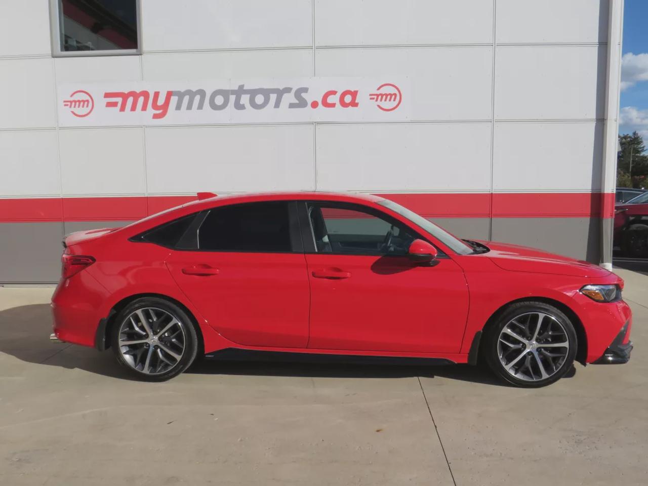 2022 Honda Civic Sedan Touring | LOW KM!! | FWD | Automatic | Alloy Wheels | Leather Seats | Heated Front & Rear Seats | Heated Steering Wheel | Power Driver & Passenger Seats | Climate Control | Sunroof | Touchscreen Display | Wireless Apple CarPlay & Android Auto | Navi Photo