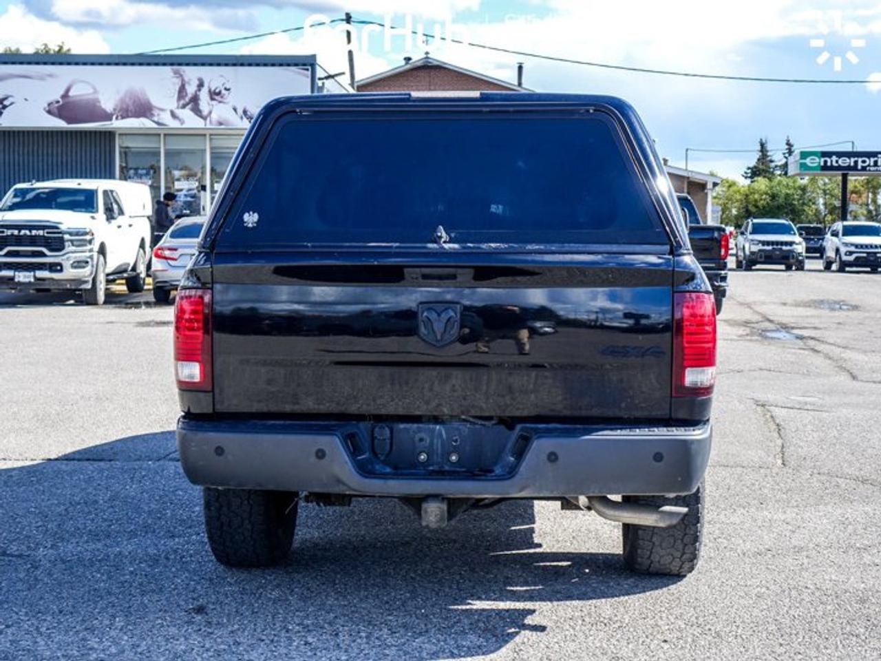 2021 RAM 1500 Classic Warlock 4x4 Quad Cab 6'4" Box 3.6L Pentastar V6 | Customer Preferred Package 29F | Electronics Convenience Group Photo