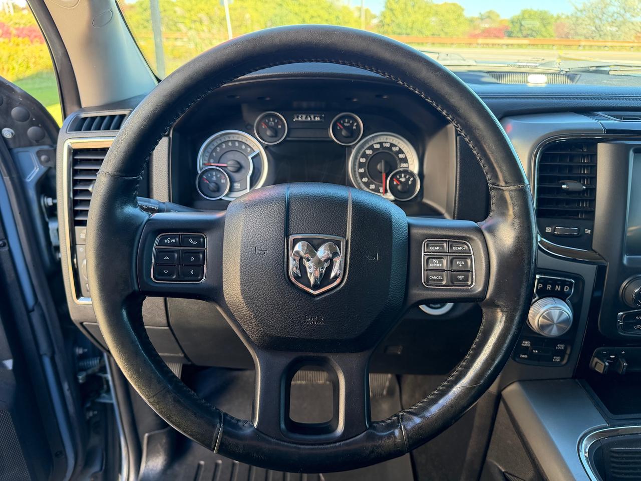 2015 RAM 1500 4WD Crew Cab 140.5" Sport Photo