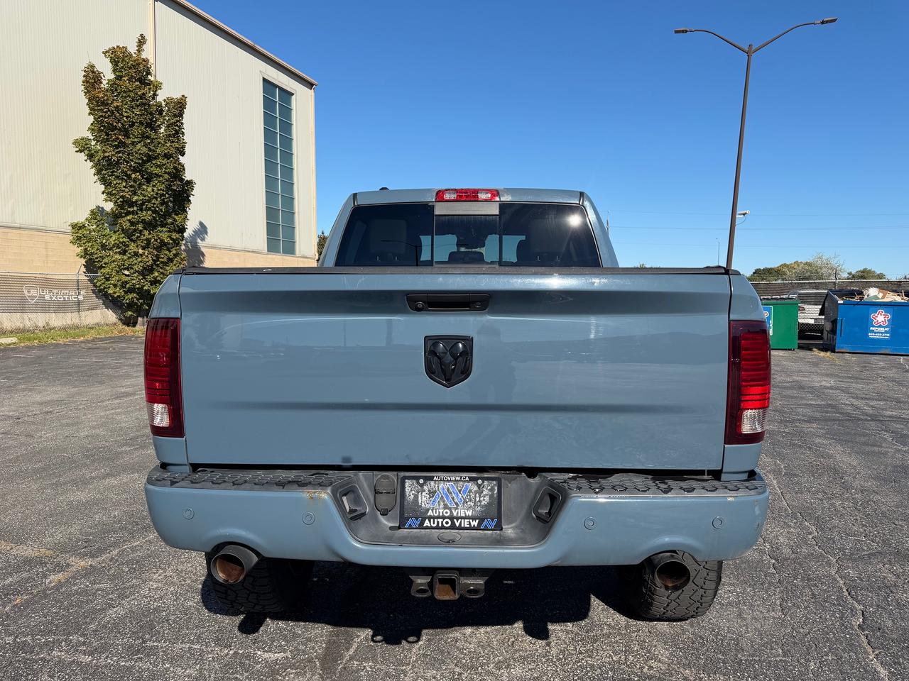 2015 RAM 1500 4WD Crew Cab 140.5" Sport Photo