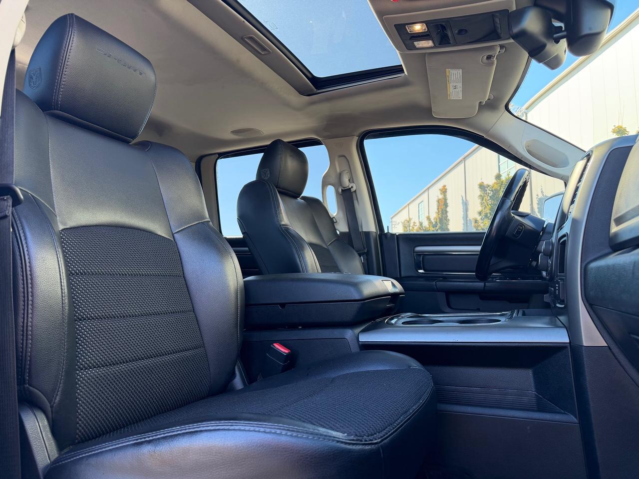 2015 RAM 1500 4WD Crew Cab 140.5" Sport Photo