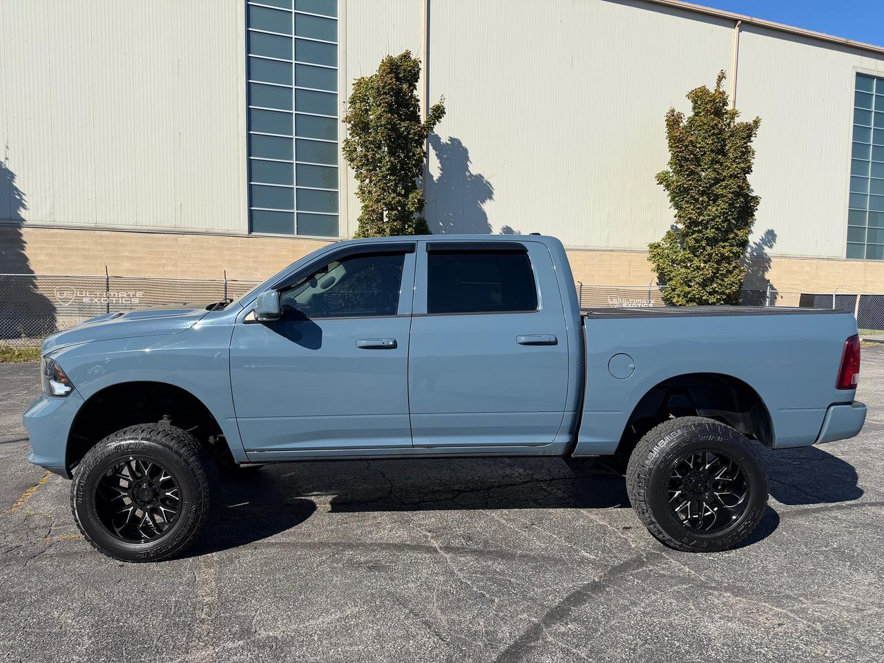 2015 RAM 1500 4WD Crew Cab 140.5" Sport Photo