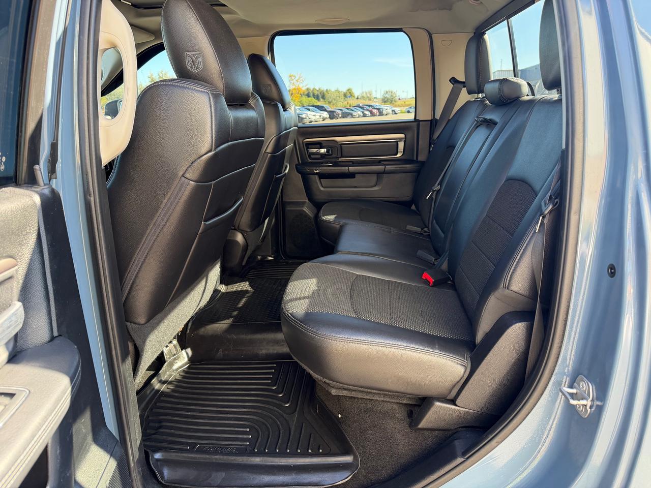 2015 RAM 1500 4WD Crew Cab 140.5" Sport Photo