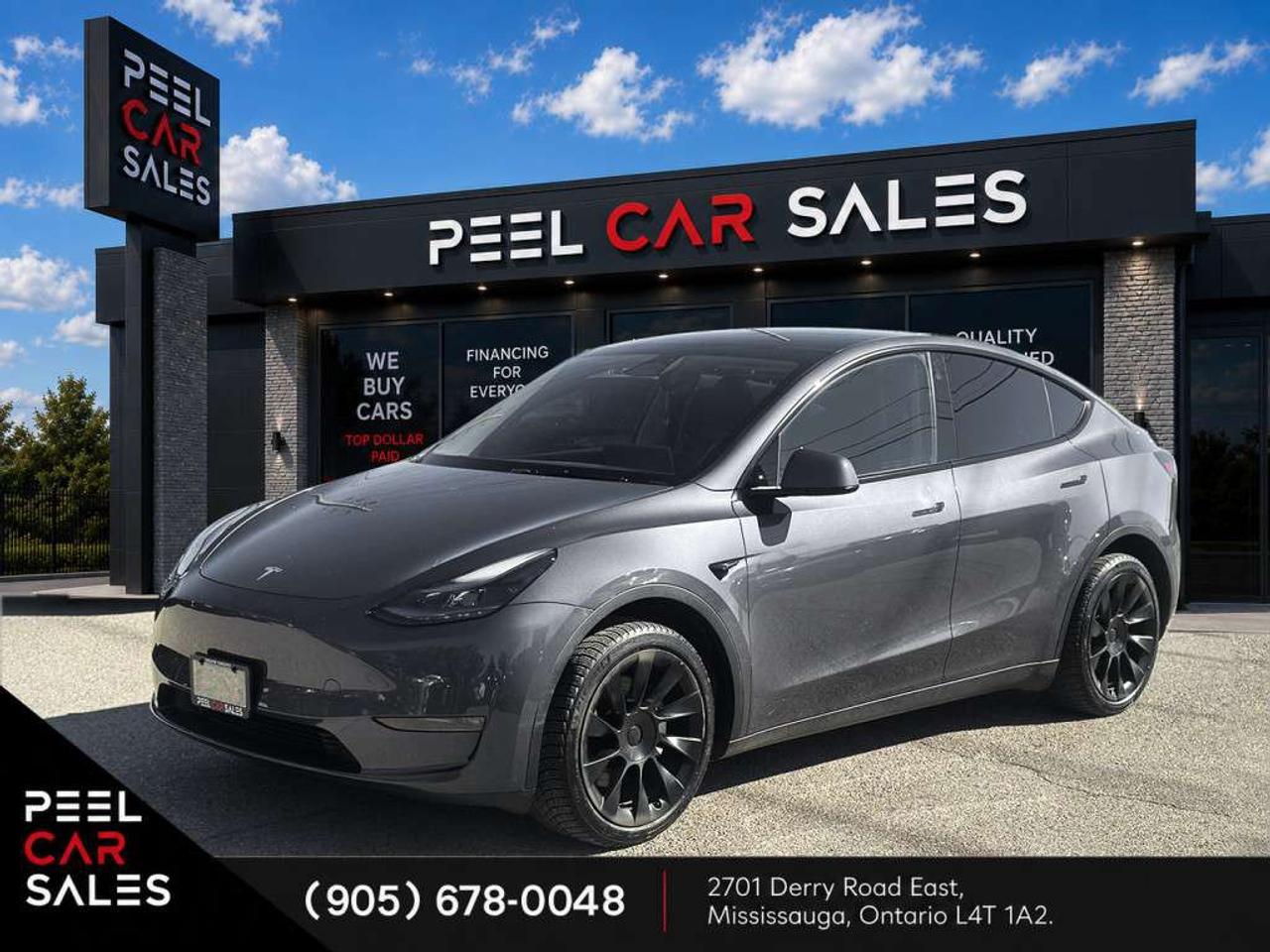 2023 Tesla Model Y Long Range AWD One-Owner. Photo0