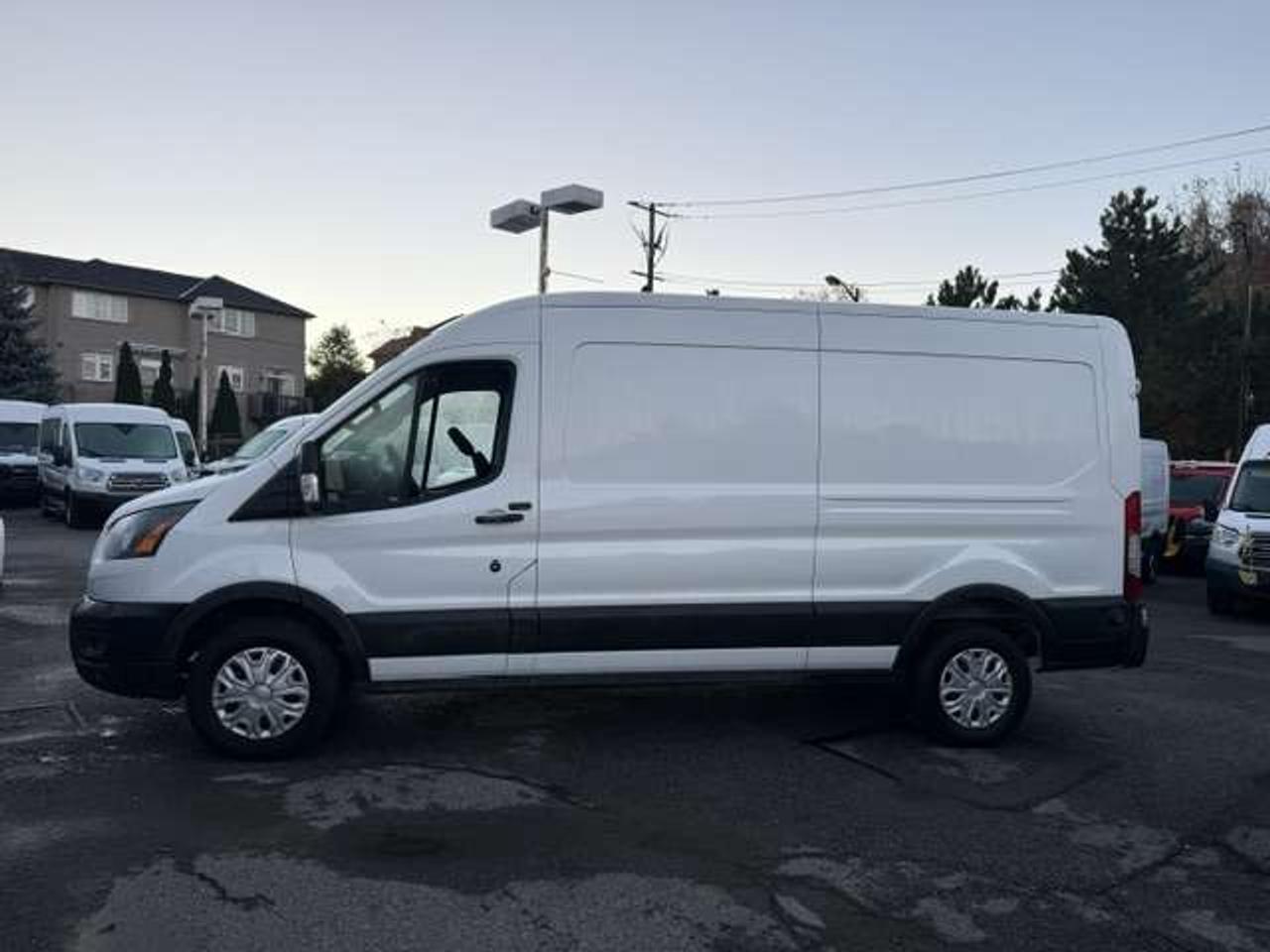 2023 Ford Transit ALL WHEEL DRIVE, Certified, mid roof. Photo