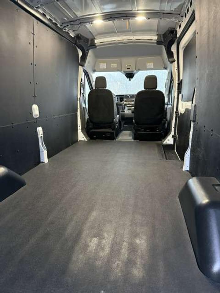 2023 Ford Transit ALL WHEEL DRIVE, Certified, mid roof. Photo