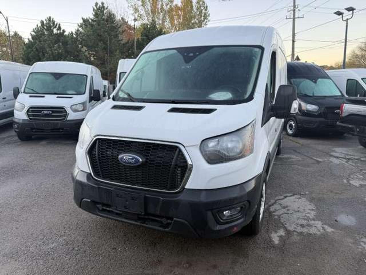 2023 Ford Transit Mid roof, Divider, Certified. no windows. Photo