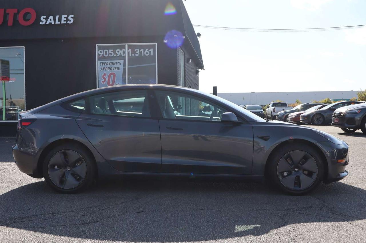 2023 Tesla Model 3 STANDARD RANGE PLUS Photo
