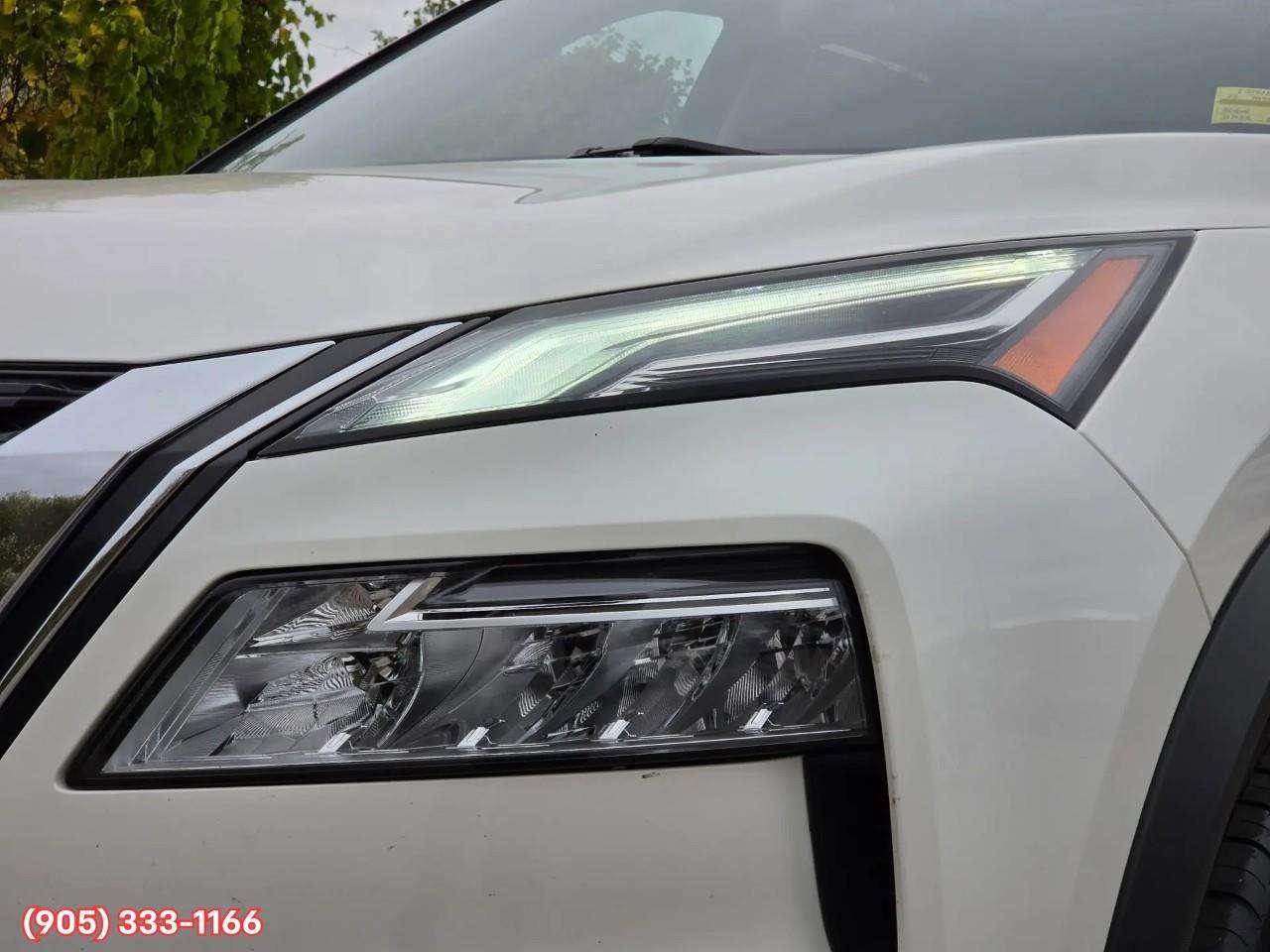 2023 Nissan Rogue Platinum Apple CarPlay & Android Auto • Heads-Up Display • Power Sunroof • Leather Seating • Built-In Navigation System • Photo