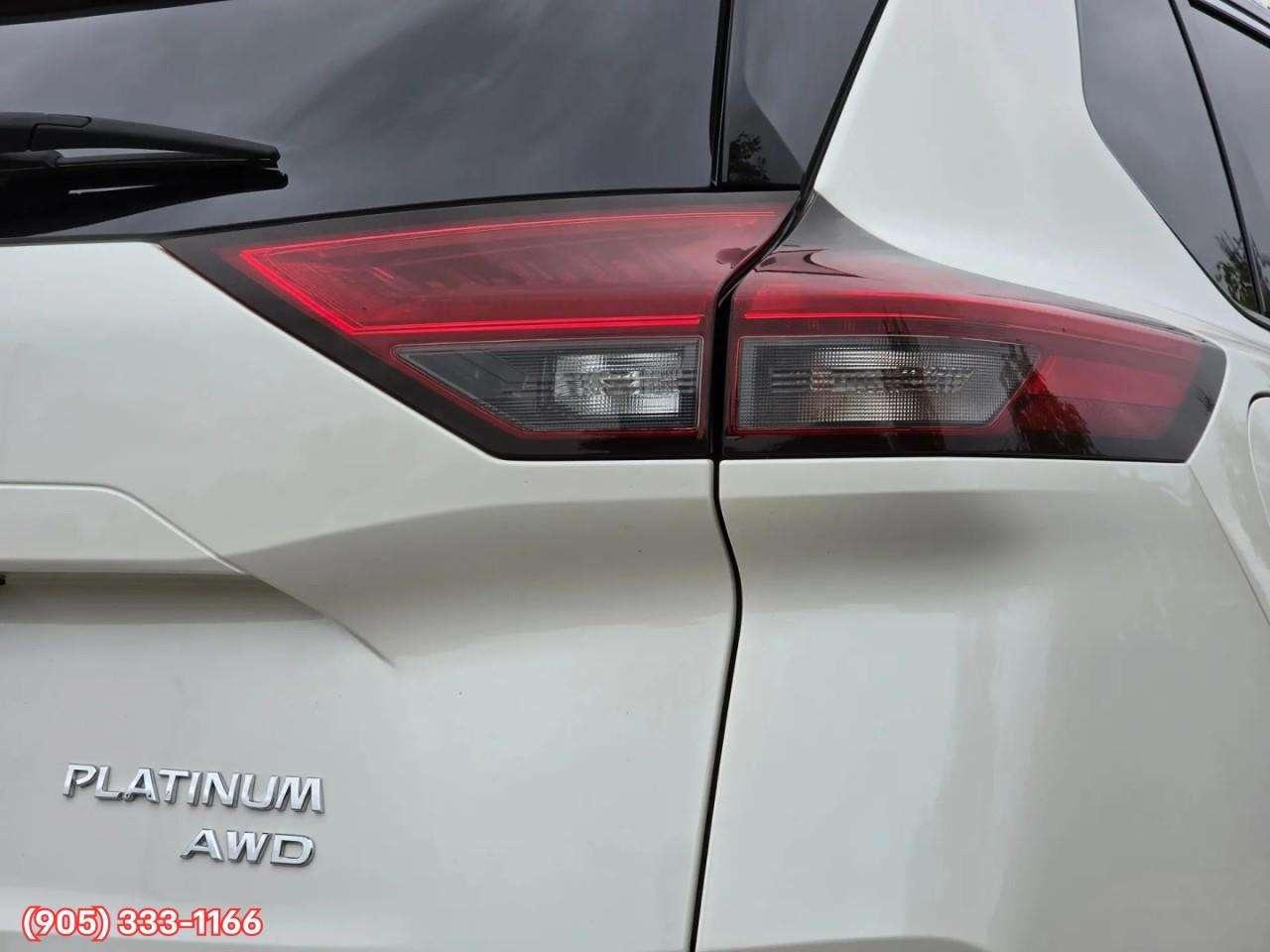 2023 Nissan Rogue Platinum Apple CarPlay & Android Auto • Heads-Up Display • Power Sunroof • Leather Seating • Built-In Navigation System • Photo