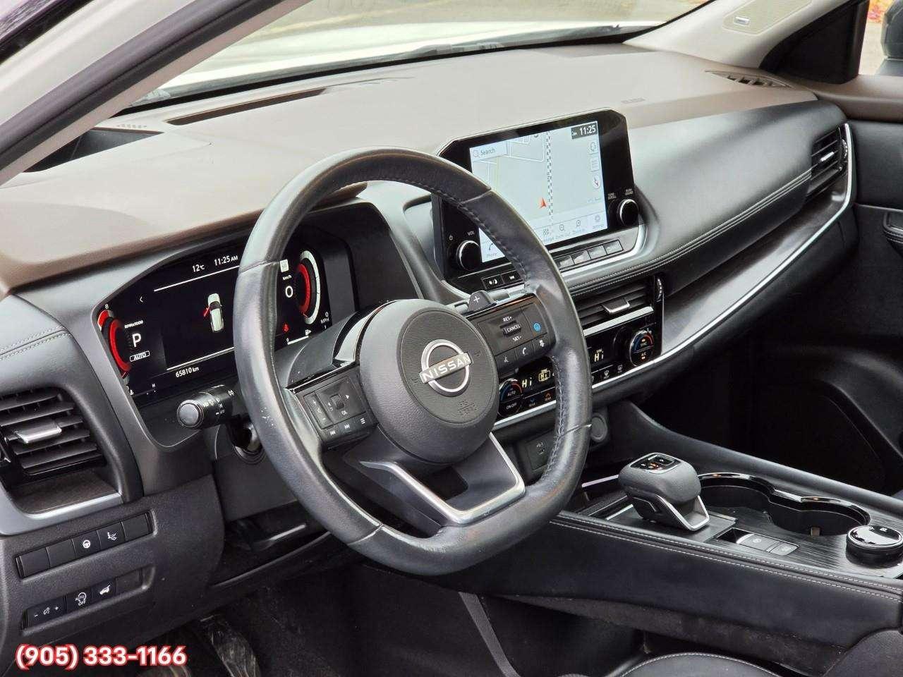 2023 Nissan Rogue Platinum Apple CarPlay & Android Auto • Heads-Up Display • Power Sunroof • Leather Seating • Built-In Navigation System • Photo