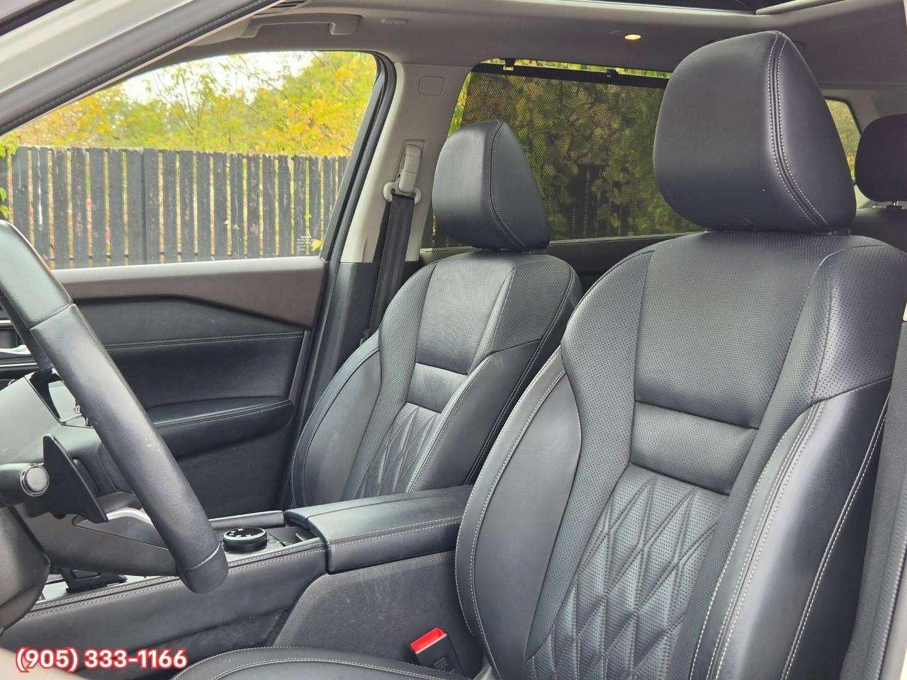 2023 Nissan Rogue Platinum Apple CarPlay & Android Auto • Heads-Up Display • Power Sunroof • Leather Seating • Built-In Navigation System • Photo