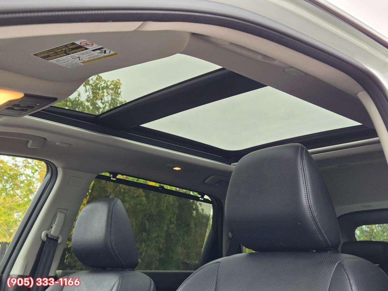 2023 Nissan Rogue Platinum Apple CarPlay & Android Auto • Heads-Up Display • Power Sunroof • Leather Seating • Built-In Navigation System • Photo