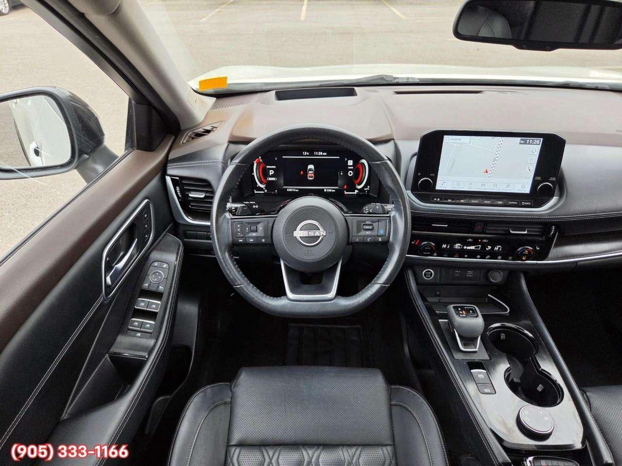 2023 Nissan Rogue Platinum Apple CarPlay & Android Auto • Heads-Up Display • Power Sunroof • Leather Seating • Built-In Navigation System • Photo