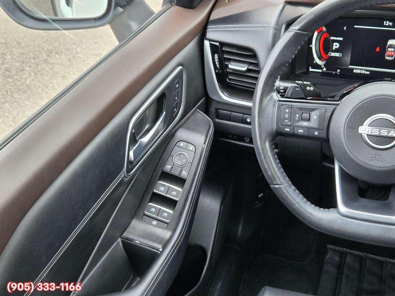 2023 Nissan Rogue Platinum Apple CarPlay & Android Auto • Heads-Up Display • Power Sunroof • Leather Seating • Built-In Navigation System • Photo