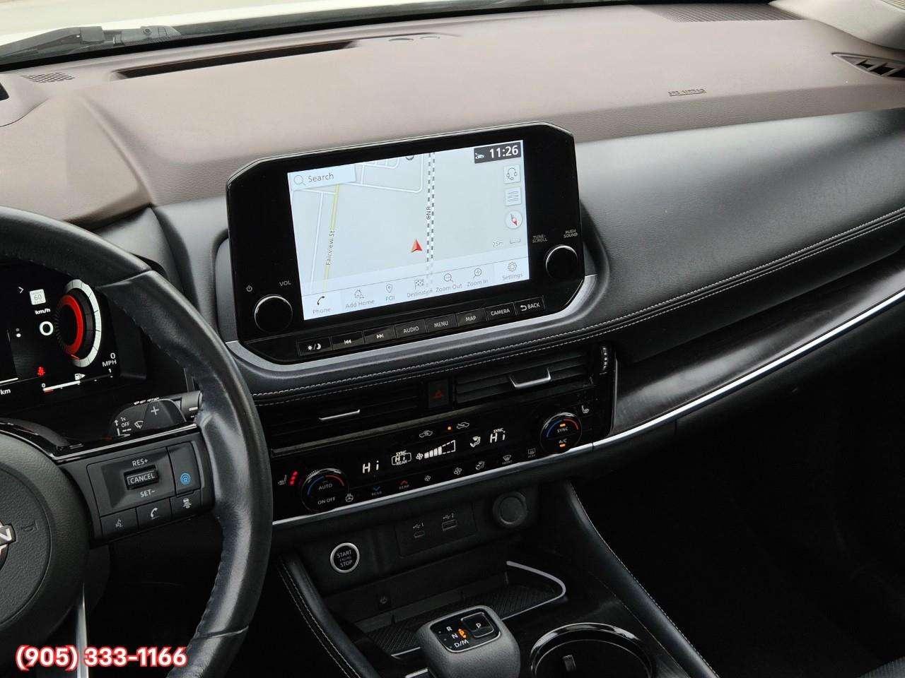 2023 Nissan Rogue Platinum Apple CarPlay & Android Auto • Heads-Up Display • Power Sunroof • Leather Seating • Built-In Navigation System • Photo