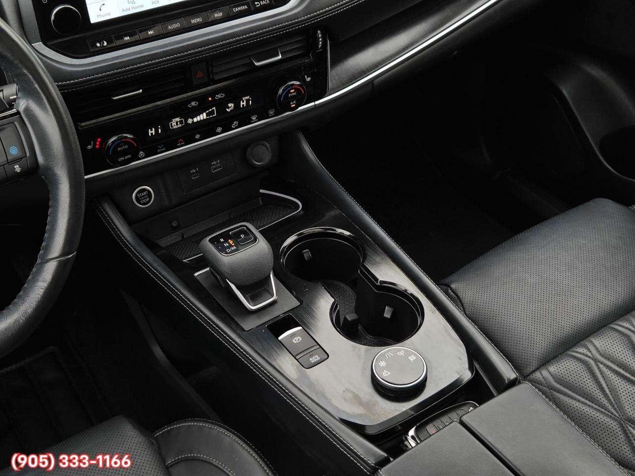 2023 Nissan Rogue Platinum Apple CarPlay & Android Auto • Heads-Up Display • Power Sunroof • Leather Seating • Built-In Navigation System • Photo