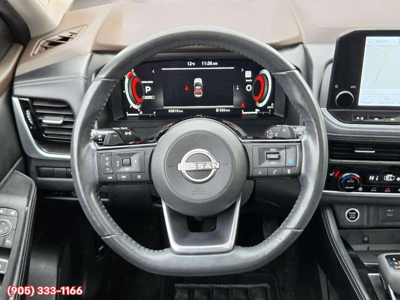 2023 Nissan Rogue Platinum Apple CarPlay & Android Auto • Heads-Up Display • Power Sunroof • Leather Seating • Built-In Navigation System • Photo