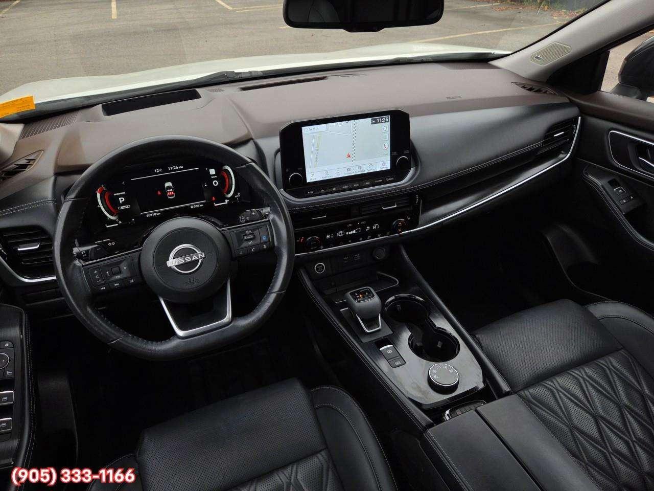 2023 Nissan Rogue Platinum Apple CarPlay & Android Auto • Heads-Up Display • Power Sunroof • Leather Seating • Built-In Navigation System • Photo