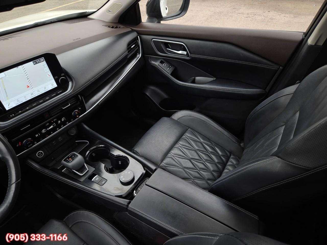 2023 Nissan Rogue Platinum Apple CarPlay & Android Auto • Heads-Up Display • Power Sunroof • Leather Seating • Built-In Navigation System • Photo