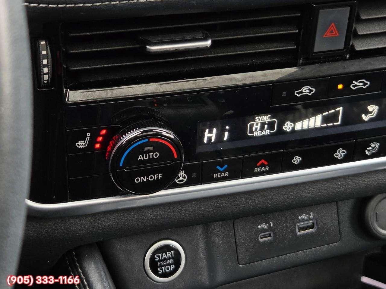 2023 Nissan Rogue Platinum Apple CarPlay & Android Auto • Heads-Up Display • Power Sunroof • Leather Seating • Built-In Navigation System • Photo
