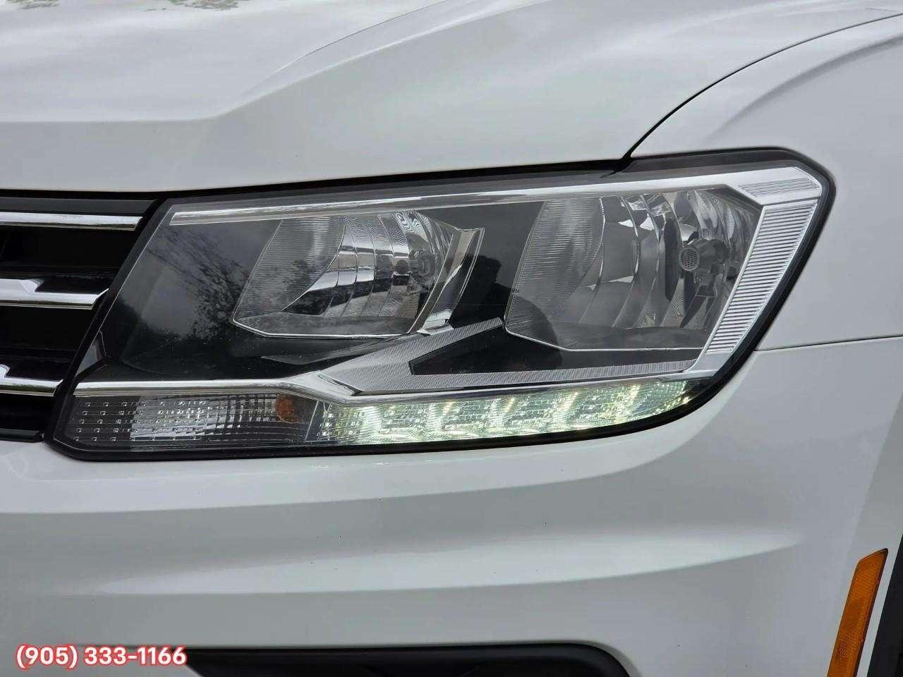 2021 Volkswagen Tiguan Trendline Apple CarPlay & Android Auto • Heated Front Seats • Lane Assist • Keyless Entry • Alloy Wheels Photo