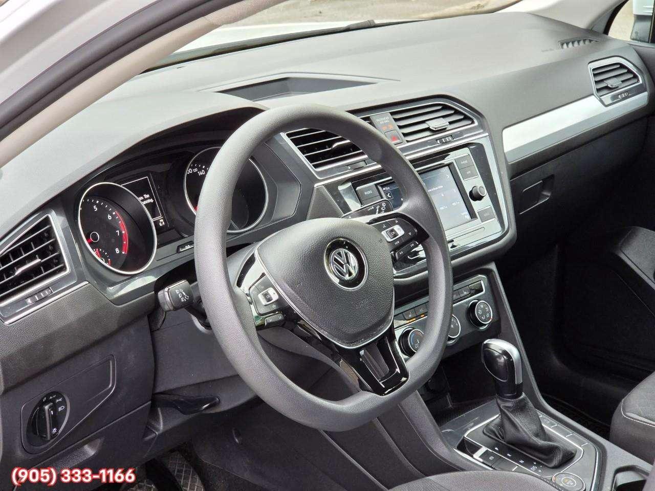 2021 Volkswagen Tiguan Trendline Apple CarPlay & Android Auto • Heated Front Seats • Lane Assist • Keyless Entry • Alloy Wheels Photo