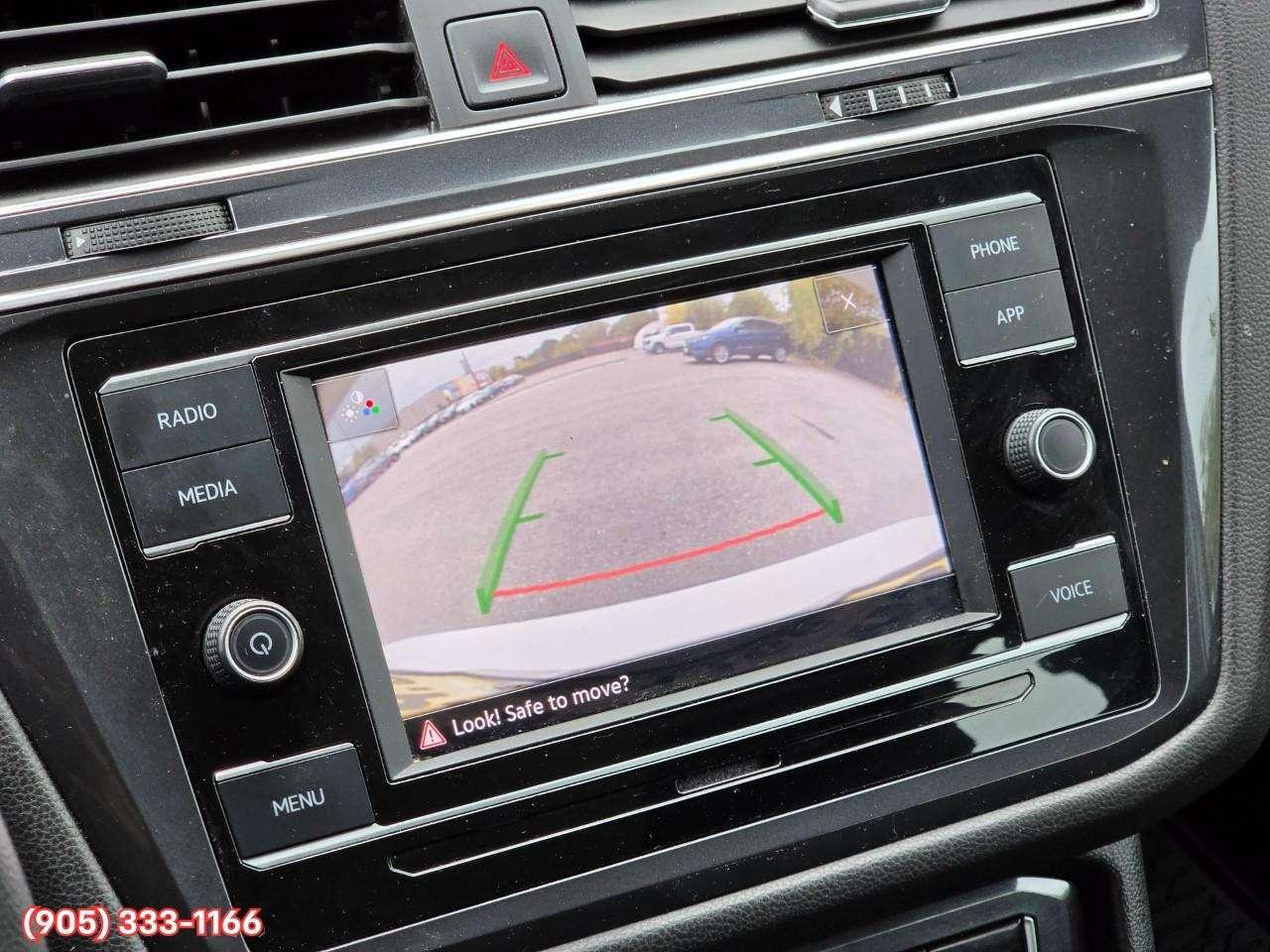 2021 Volkswagen Tiguan Trendline Apple CarPlay & Android Auto • Heated Front Seats • Lane Assist • Keyless Entry • Alloy Wheels Photo