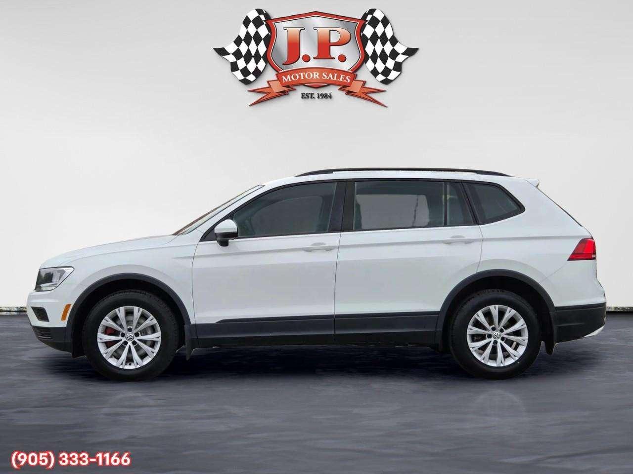2021 Volkswagen Tiguan Trendline Apple CarPlay & Android Auto • Heated Front Seats • Lane Assist • Keyless Entry • Alloy Wheels Photo