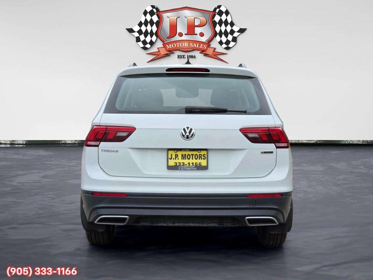 2021 Volkswagen Tiguan Trendline Apple CarPlay & Android Auto • Heated Front Seats • Lane Assist • Keyless Entry • Alloy Wheels Photo