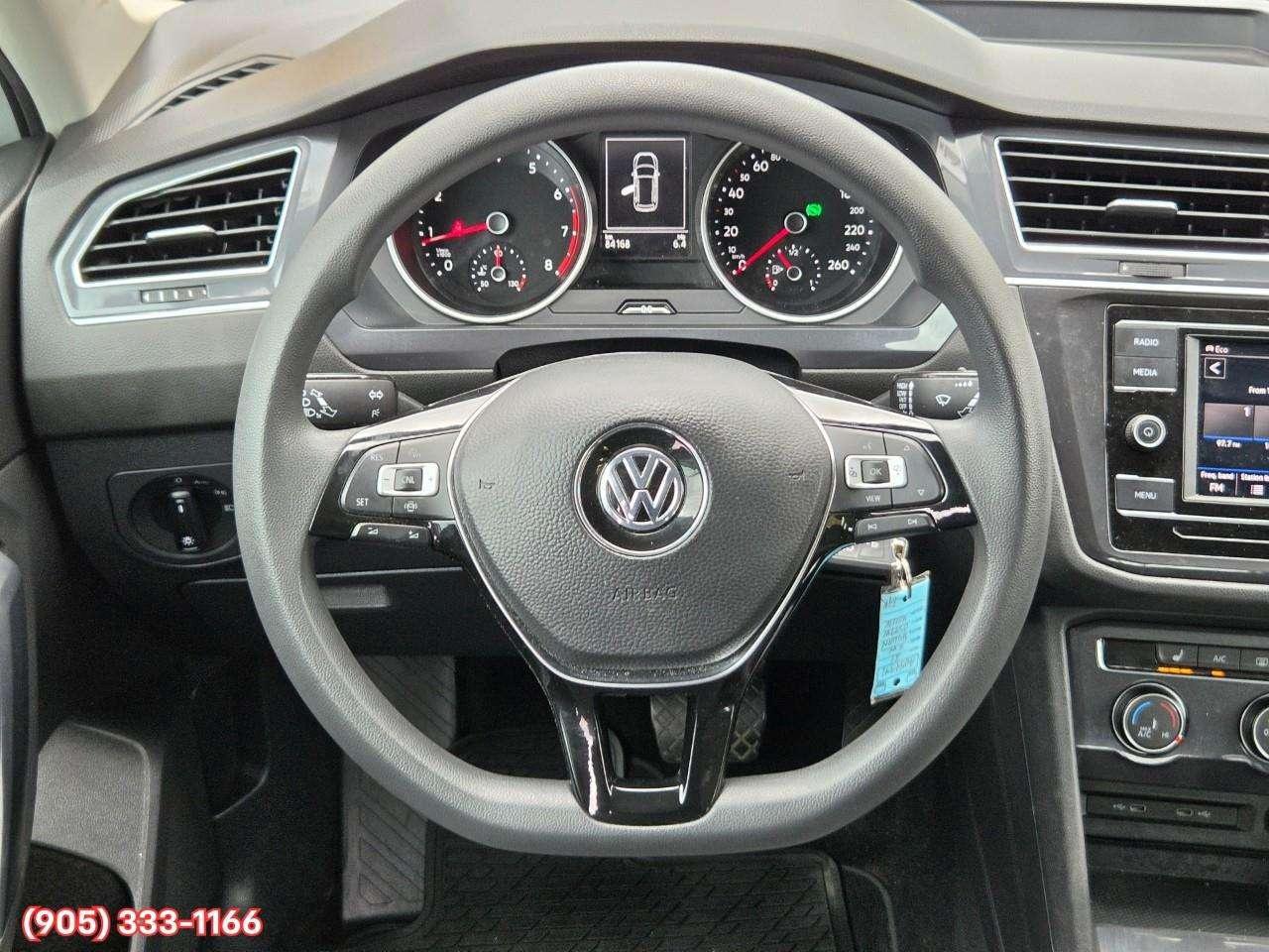 2021 Volkswagen Tiguan Trendline Apple CarPlay & Android Auto • Heated Front Seats • Lane Assist • Keyless Entry • Alloy Wheels Photo