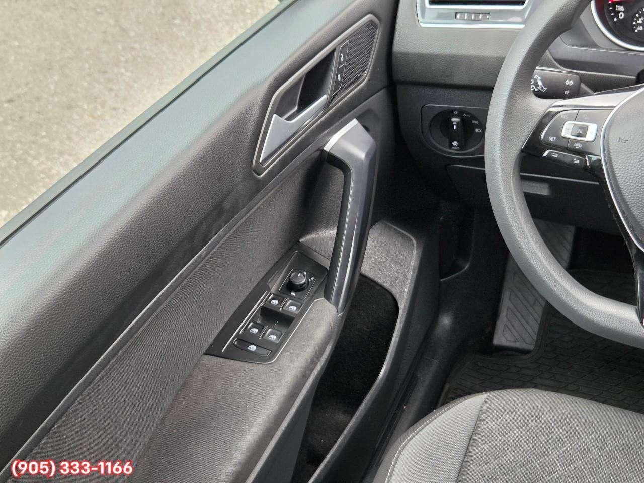 2021 Volkswagen Tiguan Trendline Apple CarPlay & Android Auto • Heated Front Seats • Lane Assist • Keyless Entry • Alloy Wheels Photo