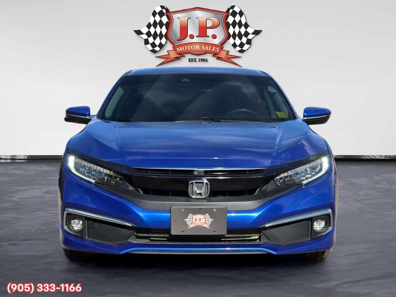 2019 Honda Civic Touring Apple CarPlay & Android Auto • Power Sunroof • Leather Seating • Built-In Navigation System • Remote Start System Photo5