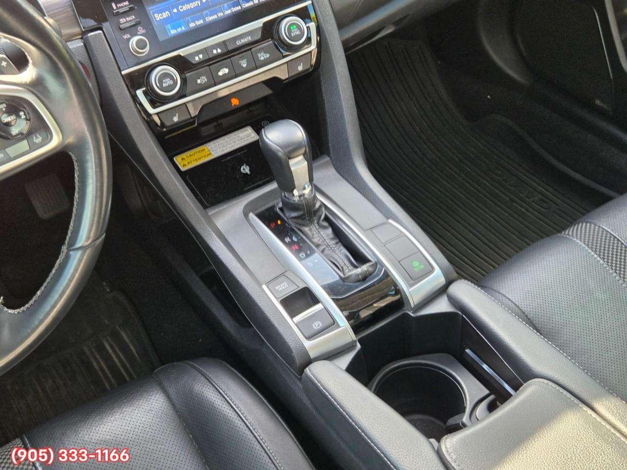 2019 Honda Civic Touring Apple CarPlay & Android Auto • Power Sunroof • Leather Seating • Built-In Navigation System • Remote Start System Photo