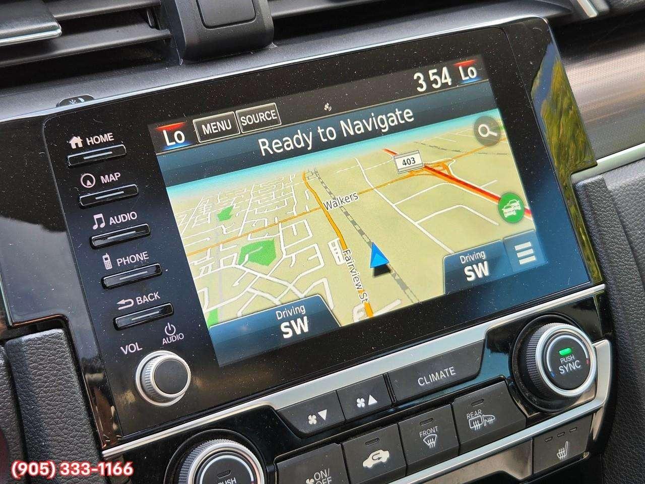 2019 Honda Civic Touring Apple CarPlay & Android Auto • Power Sunroof • Leather Seating • Built-In Navigation System • Remote Start System Photo