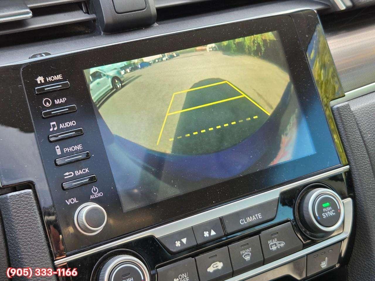 2019 Honda Civic Touring Apple CarPlay & Android Auto • Power Sunroof • Leather Seating • Built-In Navigation System • Remote Start System Photo