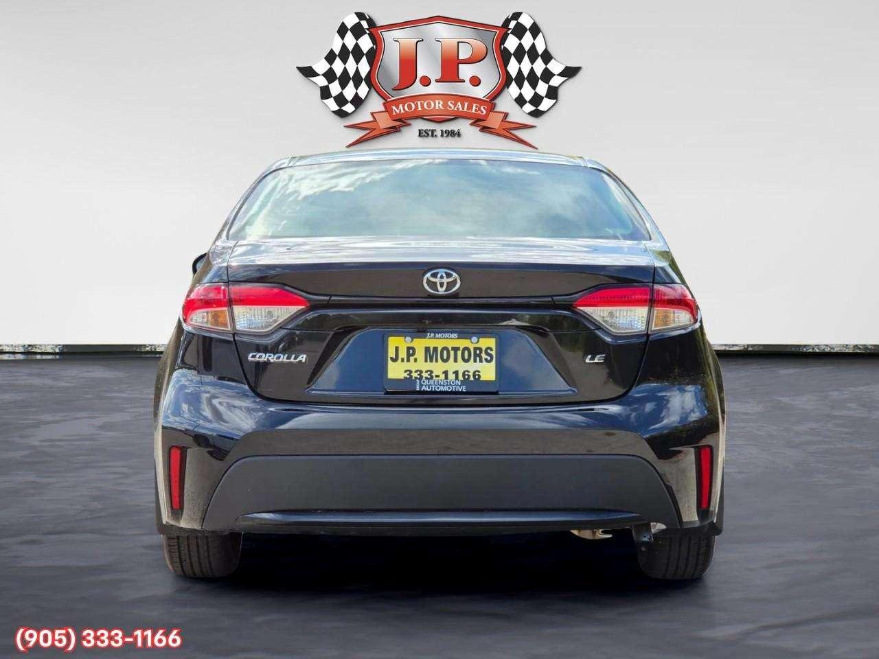 2020 Toyota Corolla LE Apple CarPlay & Android Auto • Lane Assist • Keyless Entry • Backup Camera • Cruise Control Photo