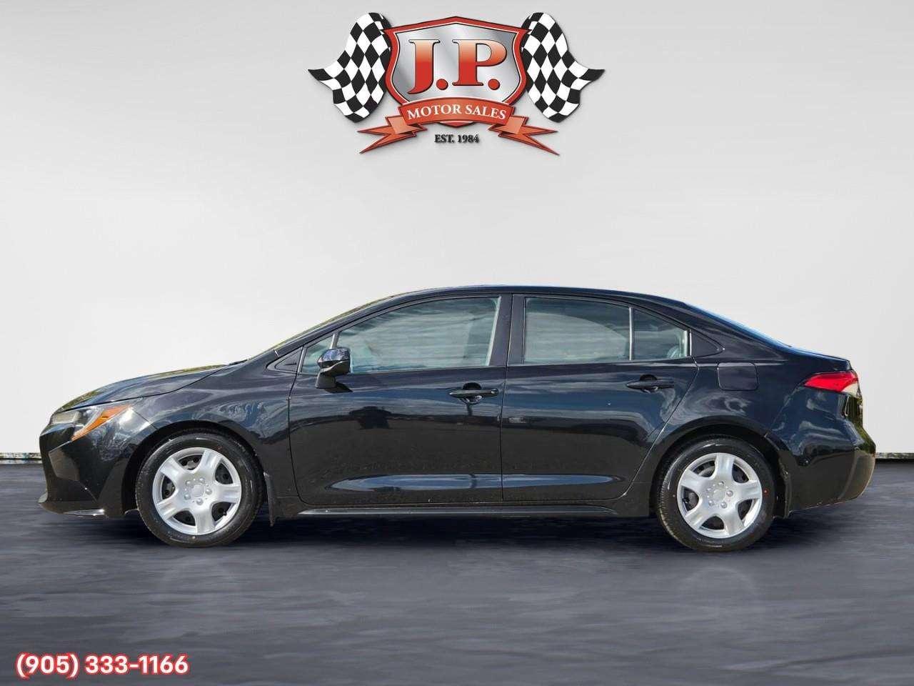 2020 Toyota Corolla LE Apple CarPlay & Android Auto • Lane Assist • Keyless Entry • Backup Camera • Cruise Control Photo