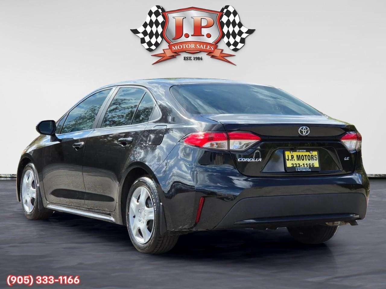2020 Toyota Corolla LE Apple CarPlay & Android Auto • Lane Assist • Keyless Entry • Backup Camera • Cruise Control Photo