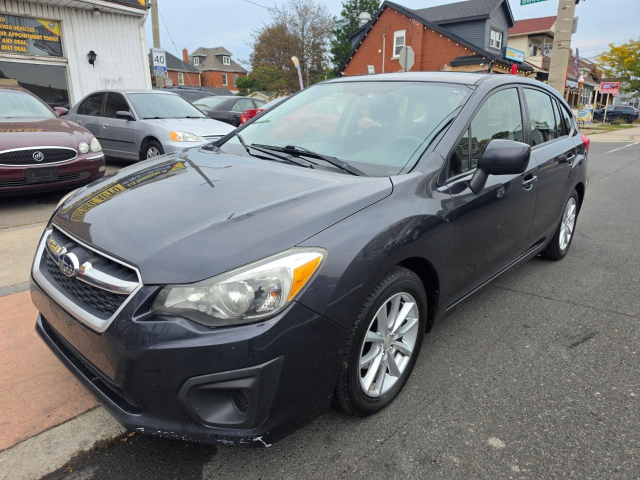 2013 Subaru Impreza 5dr HB CVT 2.0i w/Touring Pkg Photo