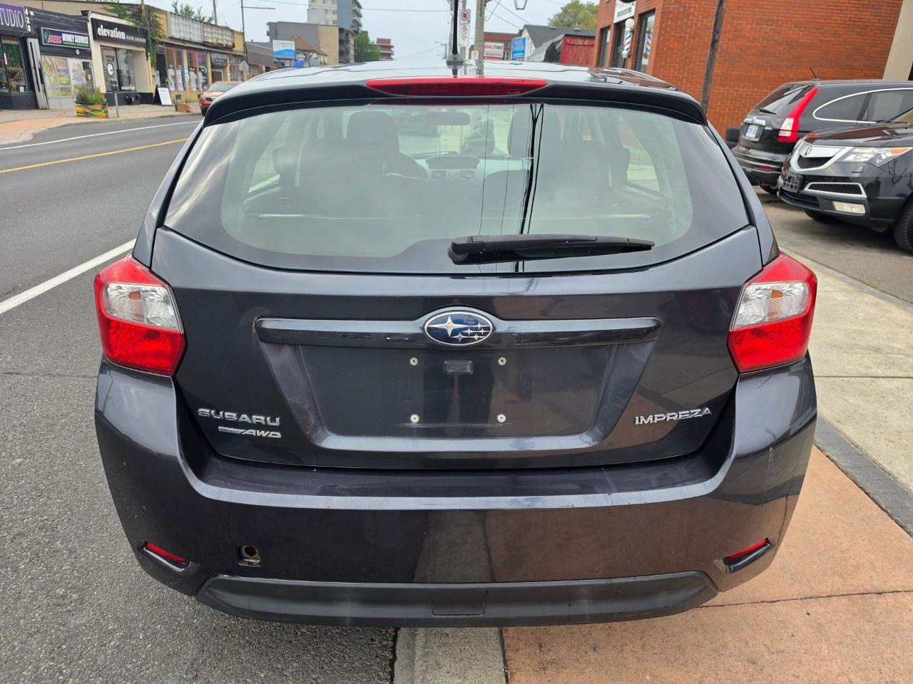 2013 Subaru Impreza 5dr HB CVT 2.0i w/Touring Pkg Photo