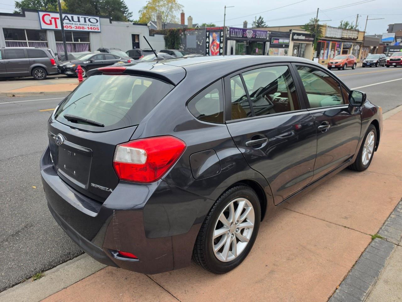 2013 Subaru Impreza 5dr HB CVT 2.0i w/Touring Pkg Photo