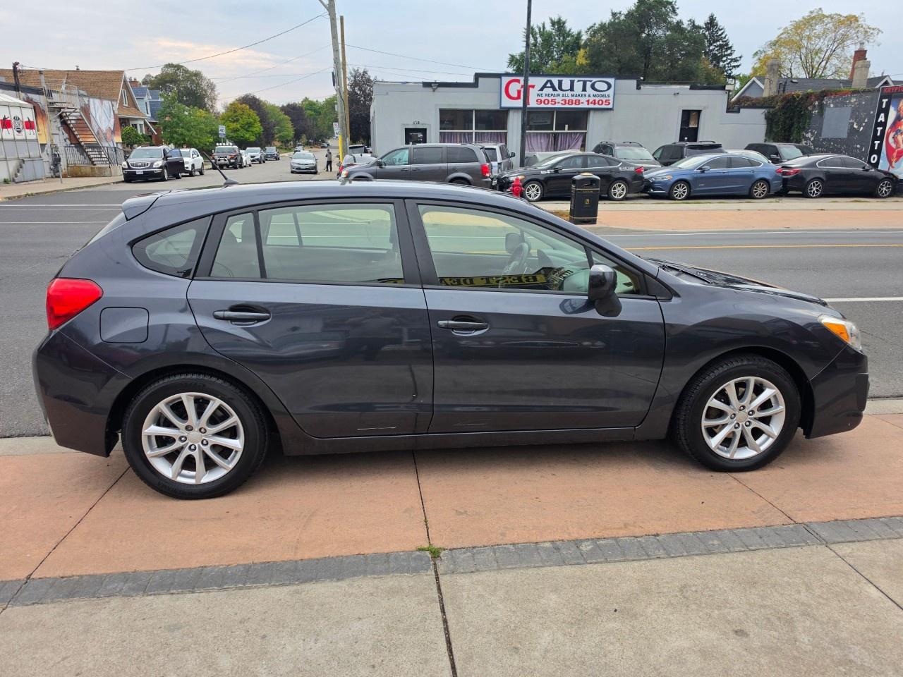 2013 Subaru Impreza 5dr HB CVT 2.0i w/Touring Pkg Photo