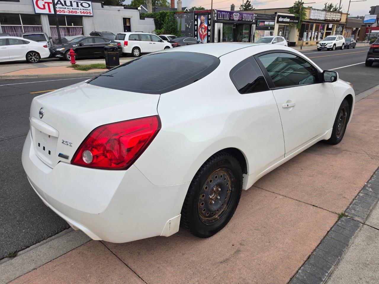 2012 Nissan Altima 2dr Cpe I4 CVT 2.5 S Photo