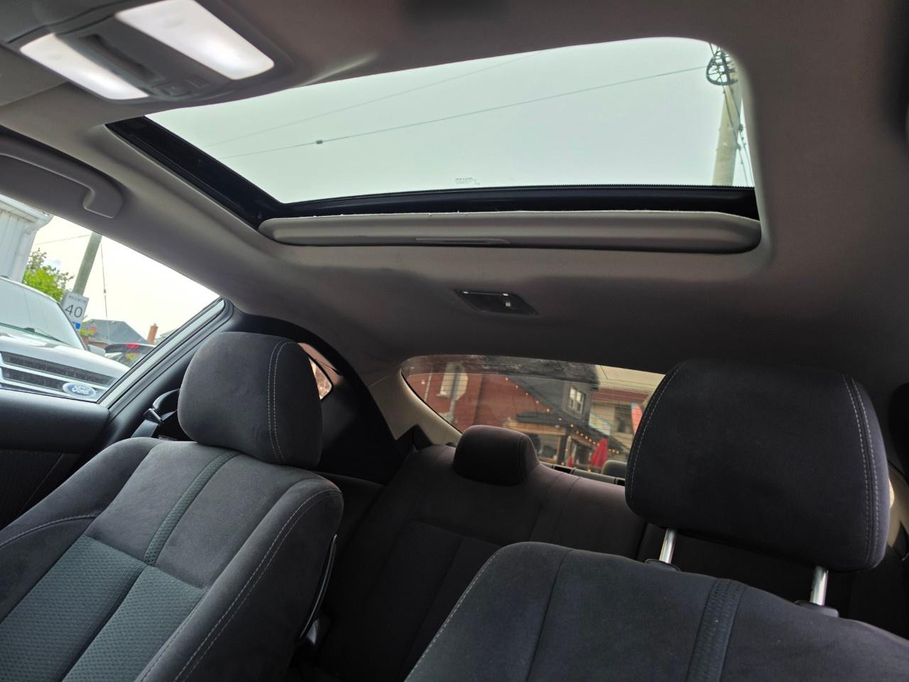 2012 Nissan Altima 2dr Cpe I4 CVT 2.5 S Photo