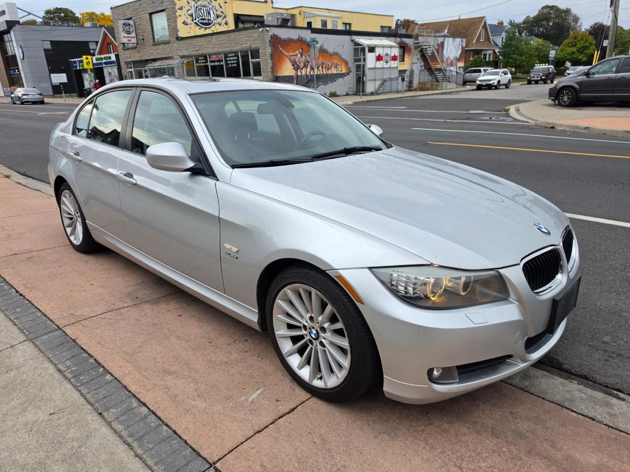 2010 BMW 3 Series 4dr Sdn 328i xDrive AWD Photo0