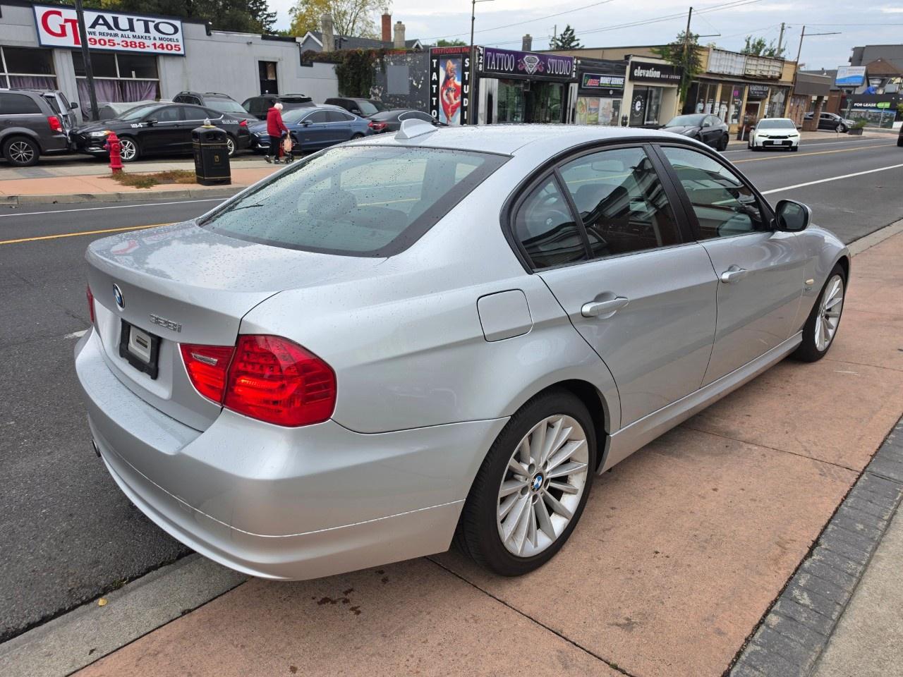 2010 BMW 3 Series 4dr Sdn 328i xDrive AWD Photo