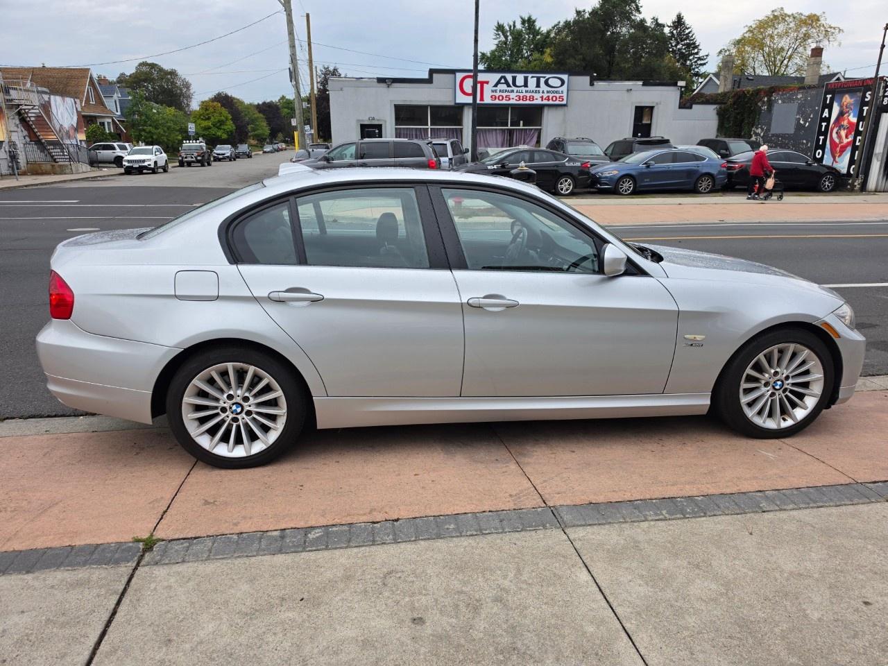 2010 BMW 3 Series 4dr Sdn 328i xDrive AWD Photo