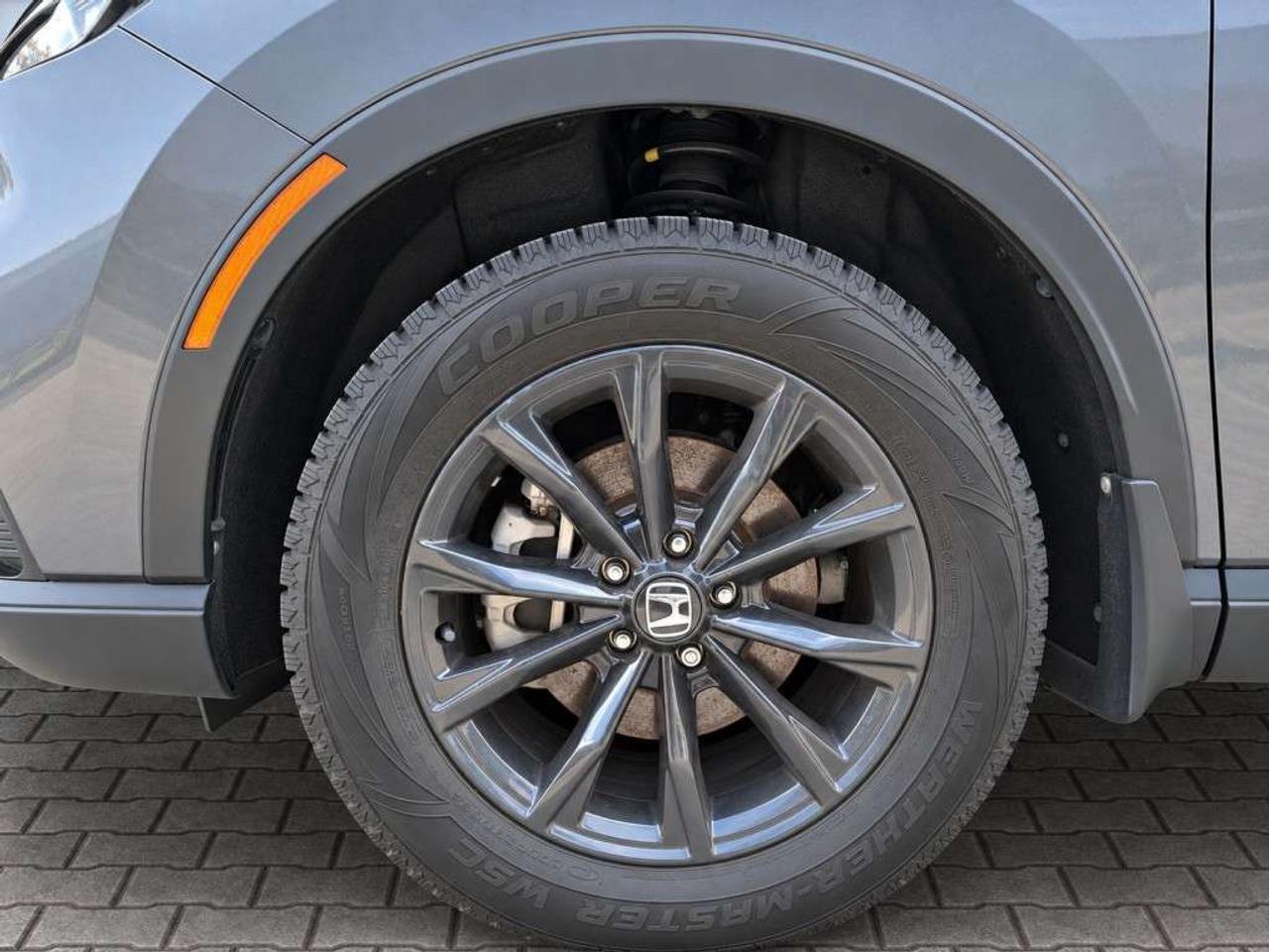 2025 Honda CR-V EX-L HYBRID / AWD / LEATHER / SUNROOF / NAVI / HEATED SEATS / HEATED WHEEL / POWER LIFTGATE Photo
